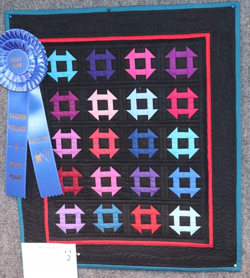 Mini-Churn-Dash-Mini-Quilt-winner-QuiltShow2025