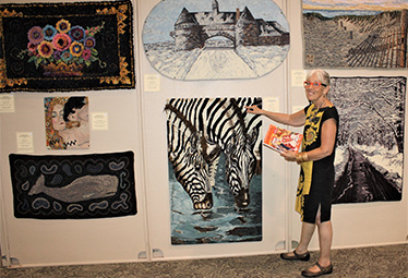 Susan Feller with Zebra Rug
