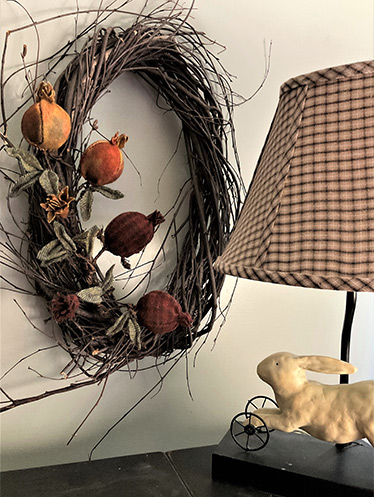 fiber art pomegranates on wreath