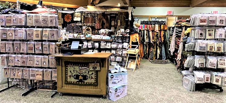 booth of products for rug hooking