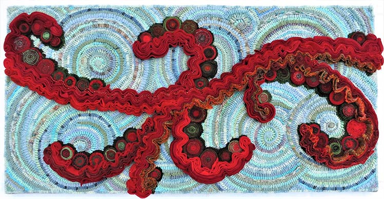 red and blue swirling design hooked Jamar workshop