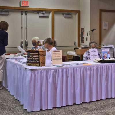 Volunteers-info-table-Rug-Hooking-Week