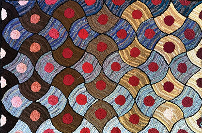 wavy red dot design rug hooked by Charlie Dalton