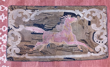 running horse rug hooked by Jenny Smallridge