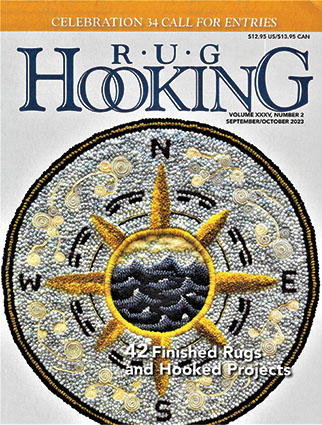 Rug hooking book with Compass on cover