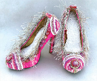 Rug hooking applied to pink shoes by Tracy Jamar