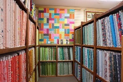 mulit-color-quilt-fabric-bolts-colorful-quilt